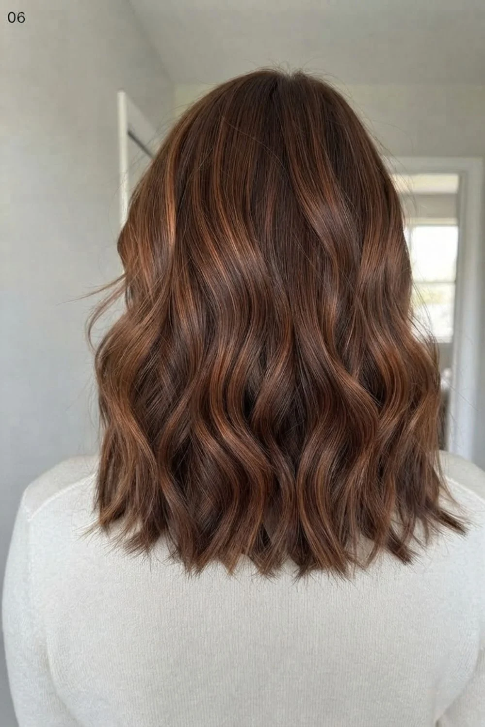 Copper brunette blend with brown depth and warm copper ribbons